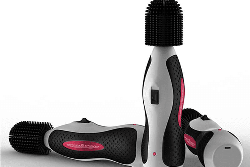 Three Groove Groom battery-powered golf club cleaners in black, white and pink